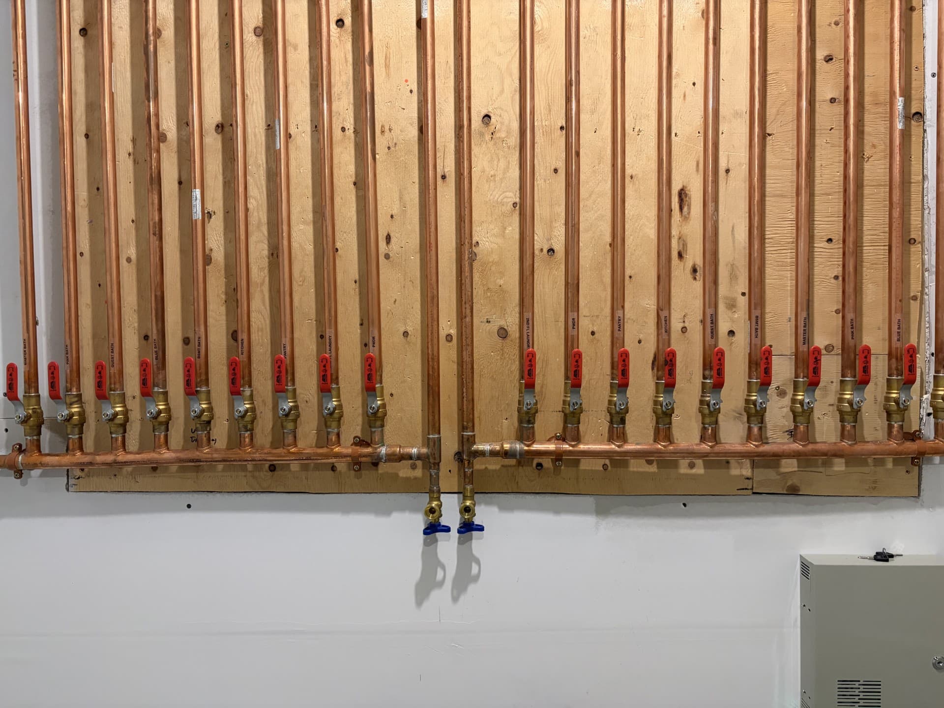 Copper pipe manifold with shutoff valves - FDR Plumbing, Milton, ON